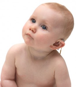 Baby with hearing aid cropped 2